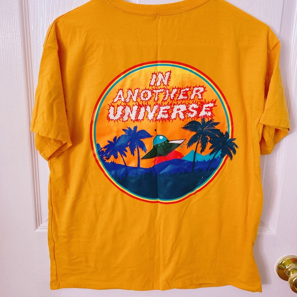Space yellow graphic tee